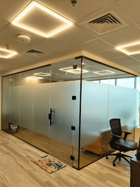 Glass room office partition forming a modern cabin in Dubai