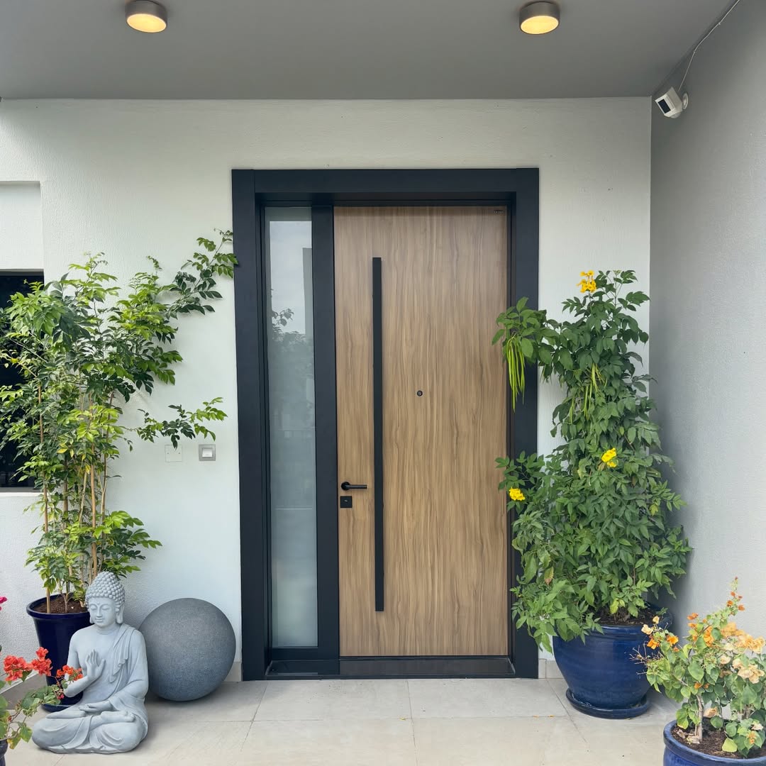 Smart glass entrance doors at a UAE office building
