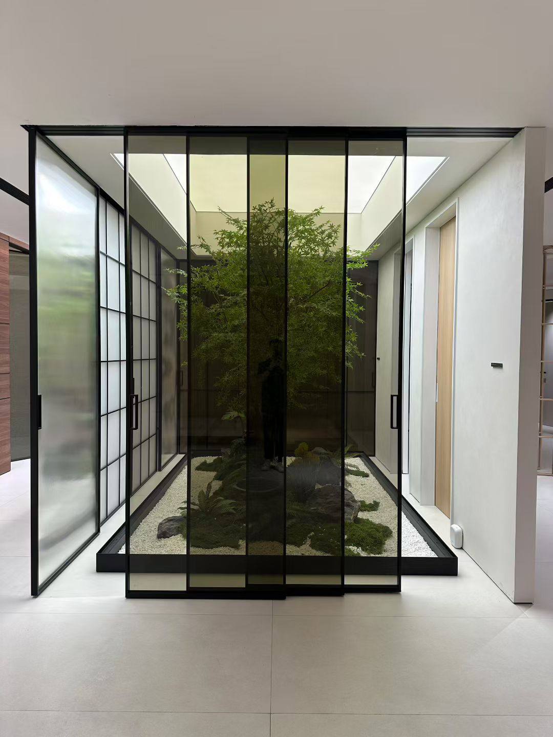 Automatic aluminium sliding door system installed in the UAE